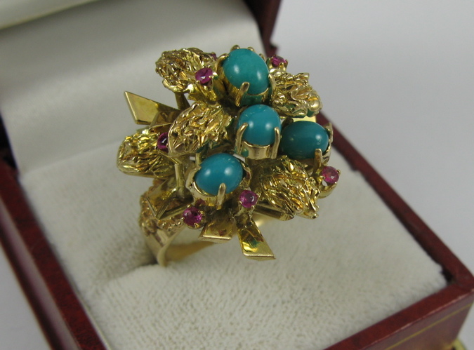 Appraisal: TURQUOISE RUBY AND K GOLD RING set with five oval