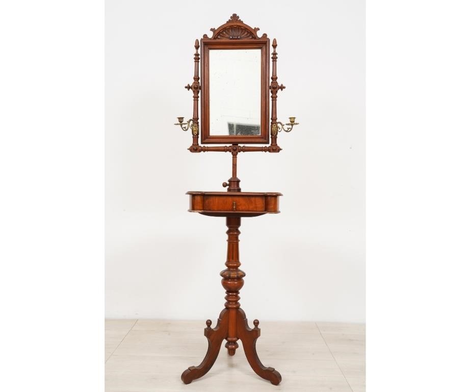 Appraisal: Victorian mahogany standing shaving mirror with shell carved crest and