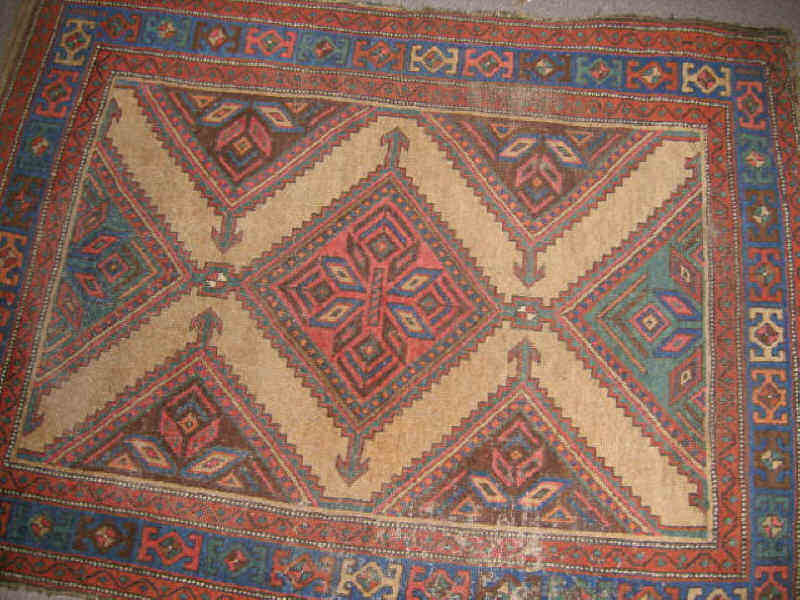 Appraisal: LATE TH CENTURY KURDISH AREA RUG The tan field of