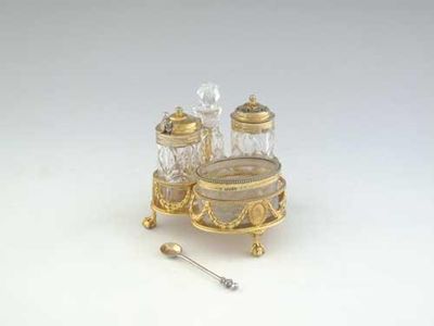 Appraisal: A Victorian silvergilt breakfast condiment set on ball and claw