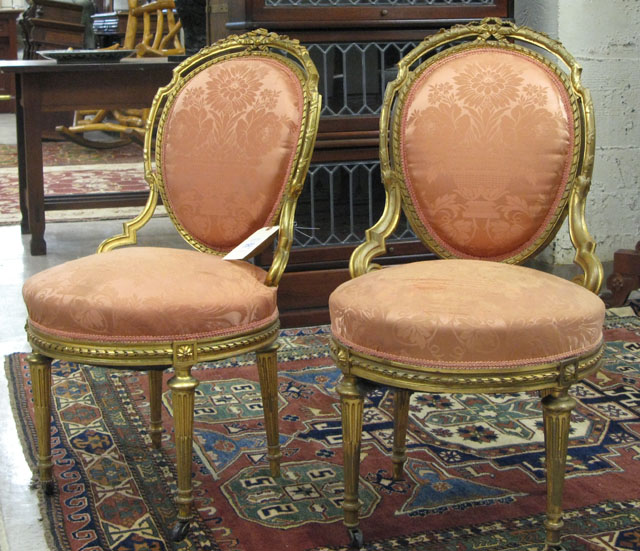 Appraisal: PAIR OF LOUIS XVI STYLE CARVED GILTWOOD SIDE CHAIRS French