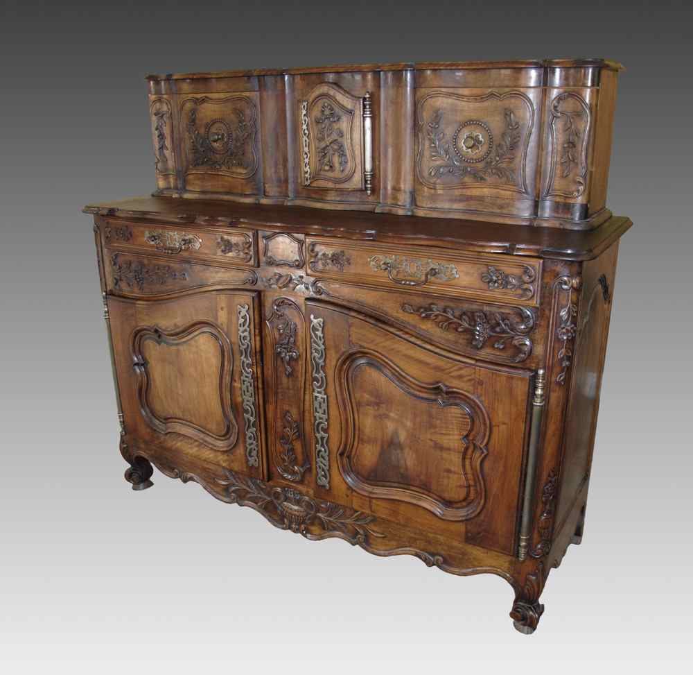 Appraisal: COUNTRY FRENCH CARVED BLACK WALNUT SIDEBOARD CABINET Mid th C