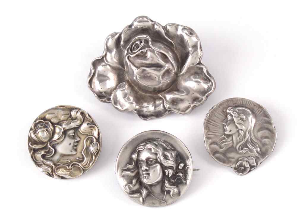 Appraisal: UNGER BROTHERS ART NOUVEAU STERLING PINS figural and floral All