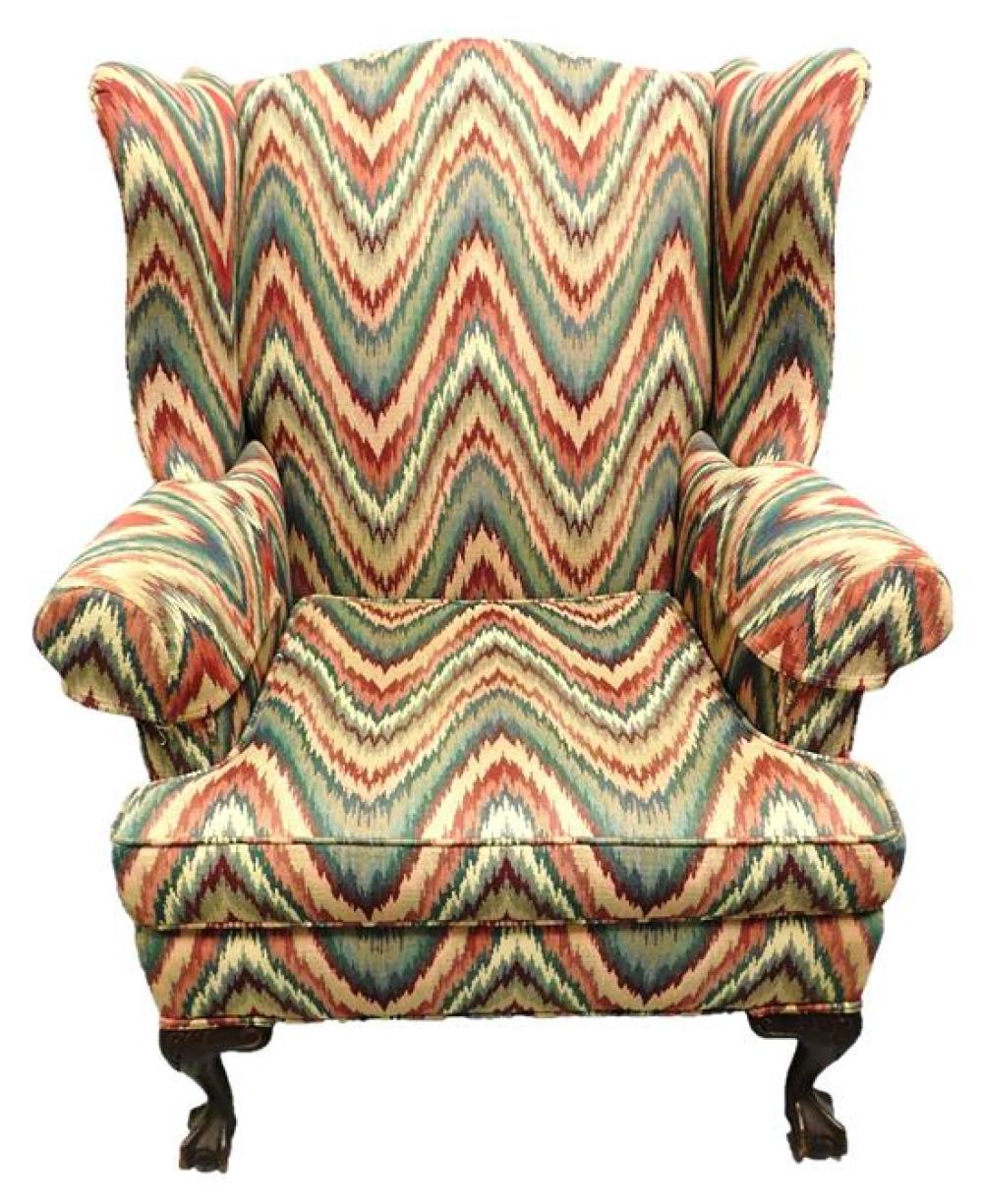 Appraisal: Wing chair Chippendale style flame-stitch pattern upholstery in red green