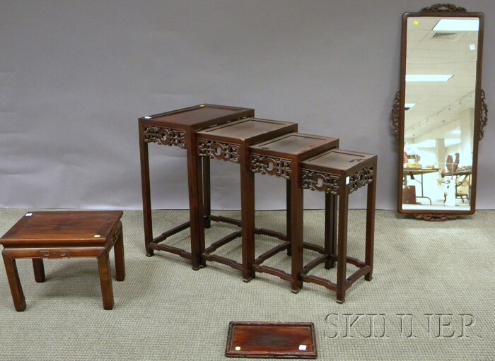 Appraisal: Four Asian Carved Hardwood Nesting Stands a Carved Rosewood Mirror