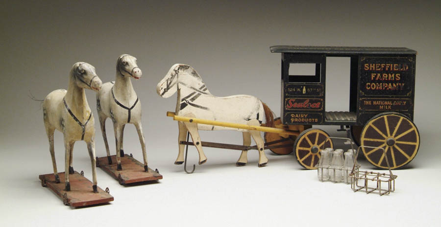 Appraisal: SHEFFIELD FARM WAGON AND TWO EXTRA HORSES A wooden wagon