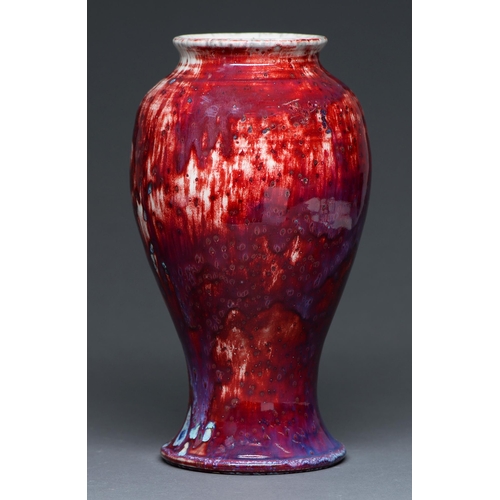 Appraisal: A Ruskin flambe glazed vase of inverted baluster shape the