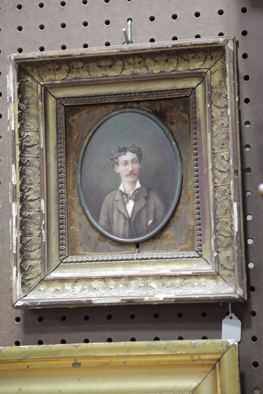 Appraisal: MINIATURE PORTRAIT Depicting a young man with a moustache wearing