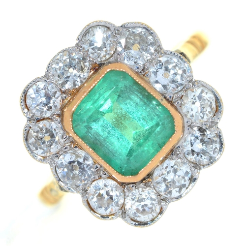 Appraisal: An emerald and diamond cluster ring the larger central step