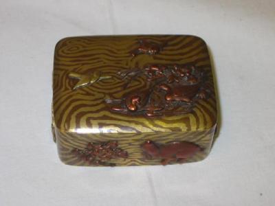 Appraisal: A JAPANESE BRASS BOX of rounded oblong form with domed