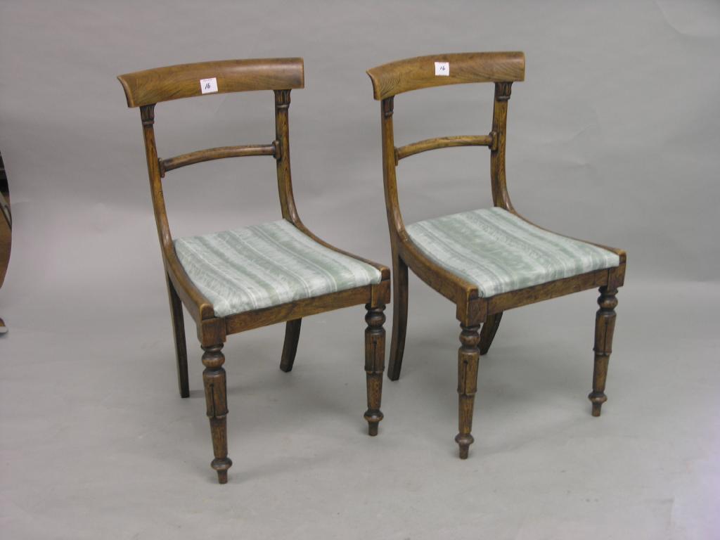 Appraisal: A set of six William IV grained rosewood dining chairs