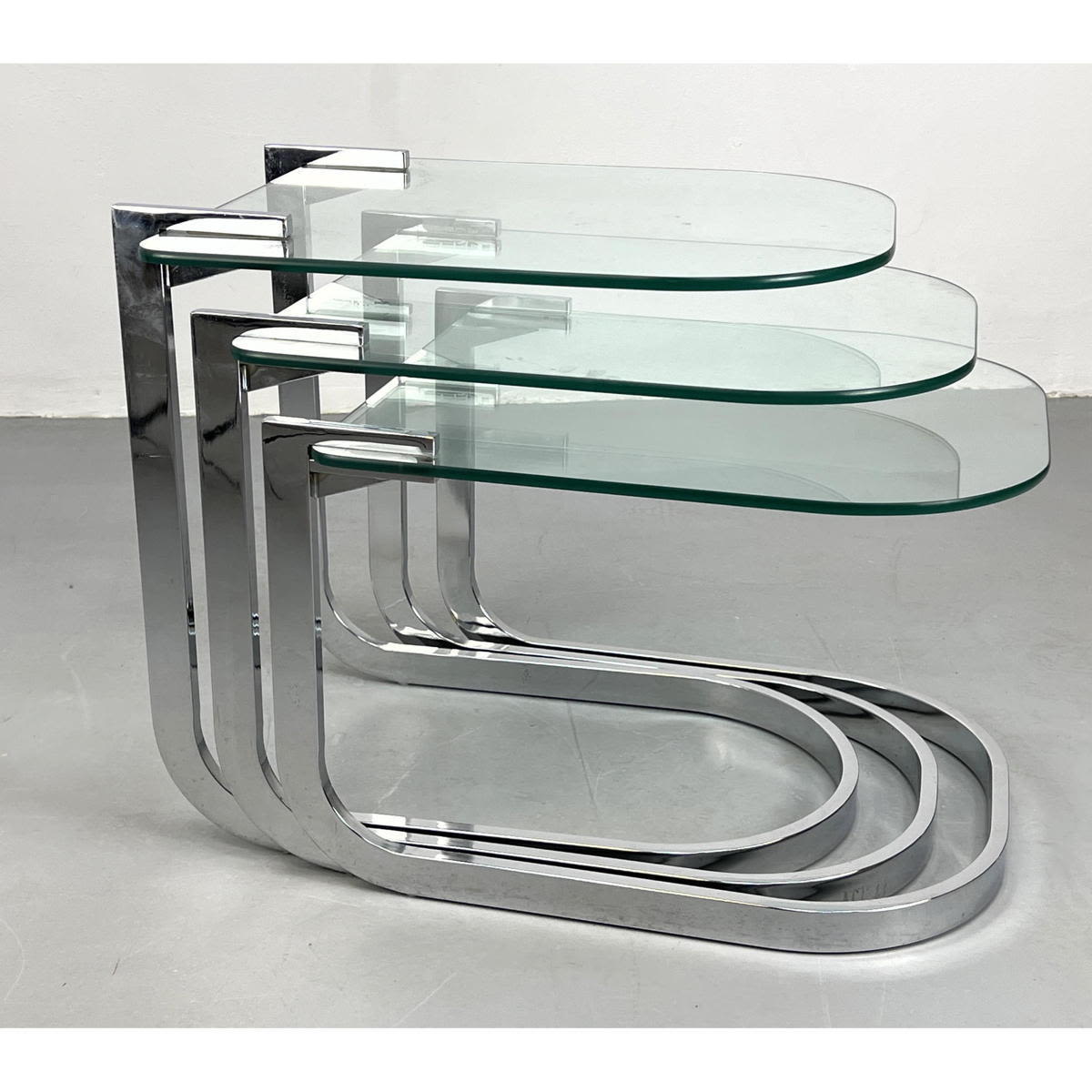 Appraisal: DIA Chrome Cantilever Glass Nesting Side Tables Not marked Dimensions