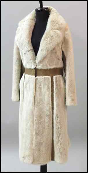 Appraisal: NEIMAN MARCUS BLUSH MINK AND SUEDE COAT Size small Condition