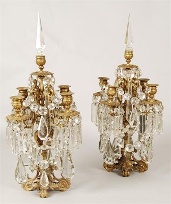 Appraisal: A pair of th century ormolu and cut glass candelabra