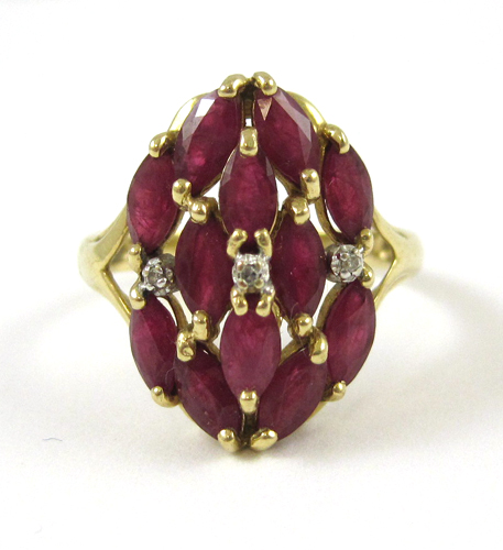 Appraisal: RUBY DIAMOND AND FOURTEEN KARAT GOLD RING set with three