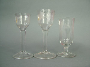 Appraisal: Three late th century drinking glasses comprising two wine glasses