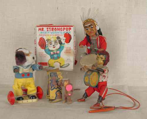 Appraisal: Two battery operated toys th c together with a wind-up