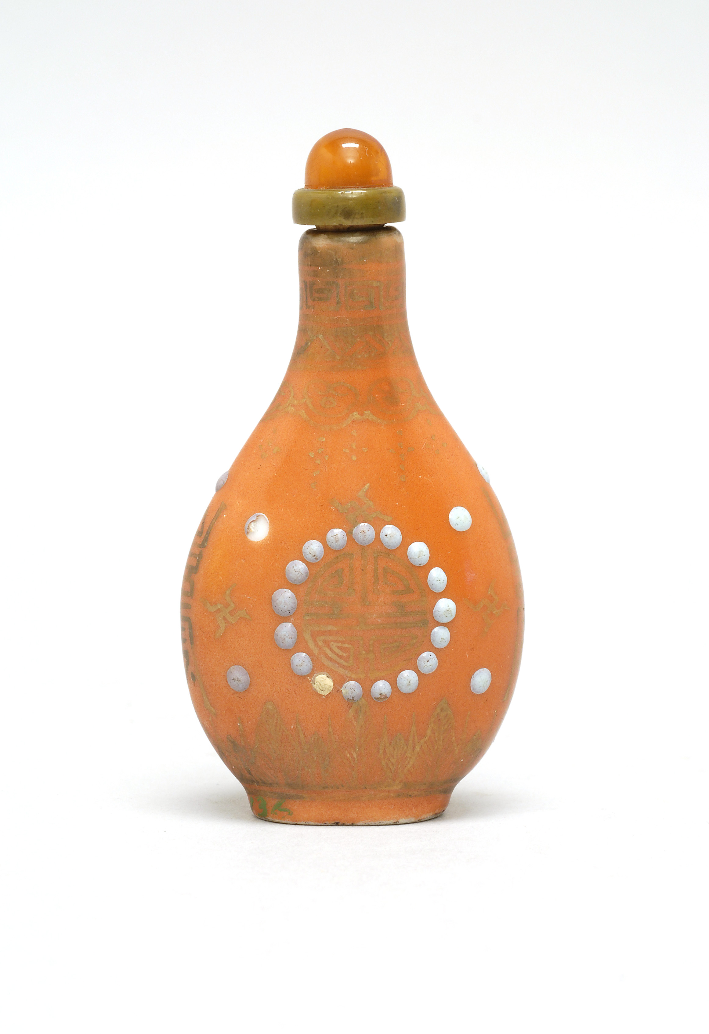 Appraisal: CORAL-RED PORCELAIN SNUFF BOTTLE th CenturyIn pear shape with gilt