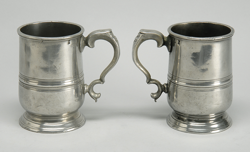 Appraisal: MATCHING PAIR OF ENGLISH PEWTER PINT MUGS Mid- th CenturyHeights