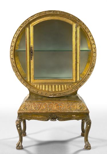 Appraisal: Unusual Continental Giltwood Vitrine early th century the circular-form vitrine