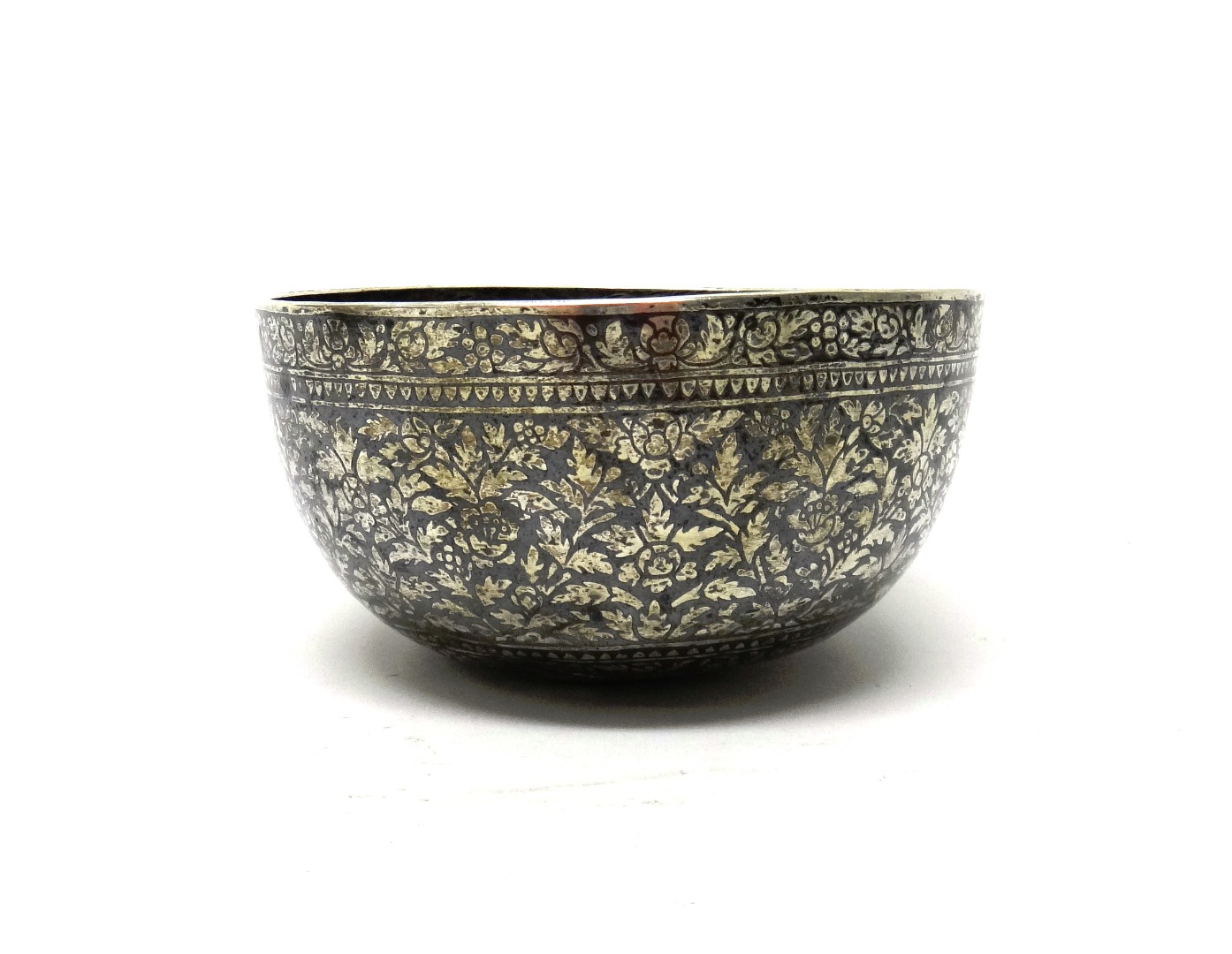 Appraisal: An Eastern niello decorated bowl of circular form with floral