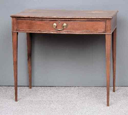 Appraisal: A late Georgian mahogany bow-front side table fitted single drawer