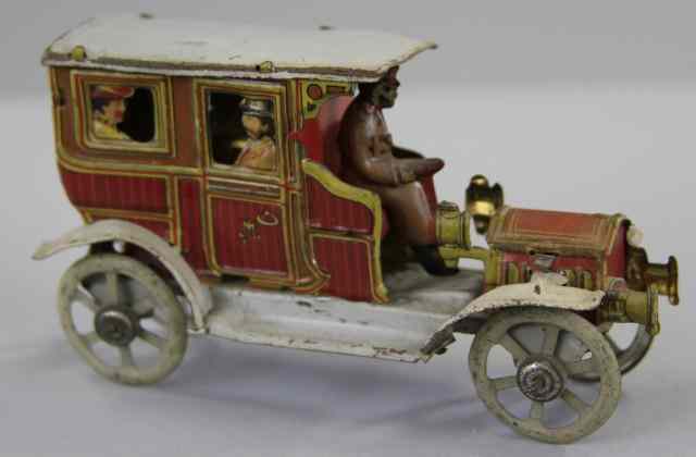 Appraisal: MEIER LIMOUSINE PENNY TOY Germany lithographed tin die cut passengers