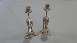 Appraisal: A pair of silvered candlesticks