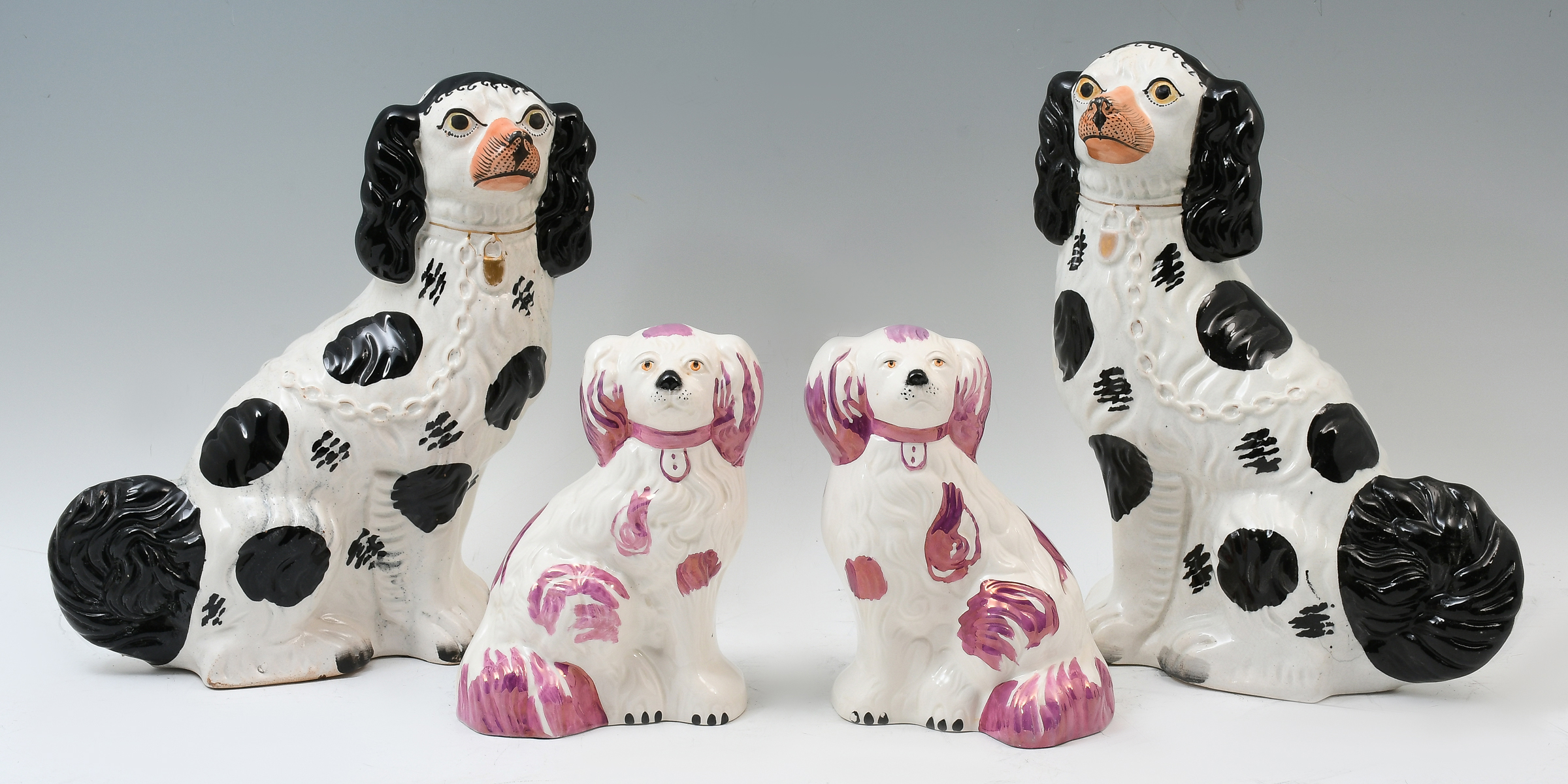 Appraisal: PC STAFFORDSHIRE PORCELAIN DOG COLLECTION Comprising - Black white Spaniels