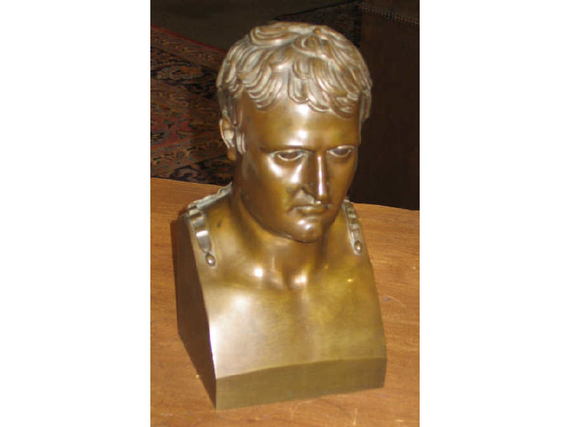 Appraisal: BRONZE BUST OF A MAN Romanesque figure having curly hair