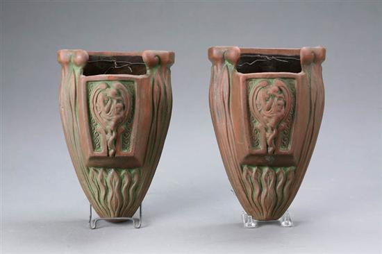 Appraisal: PAIR OF ART POTTERY WALL POCKETS Attributed to Peters Reed