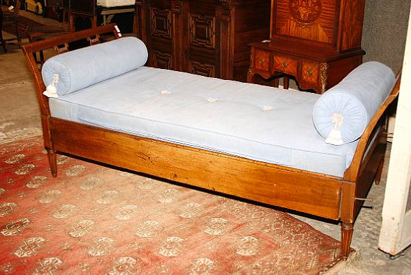 Appraisal: A Neoclassical style fruitwood daybed late th early th century