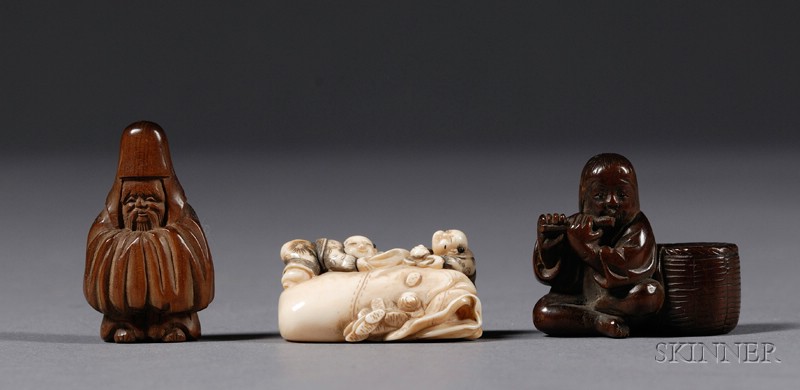 Appraisal: Three Netsuke th century an ivory netsuke of two children