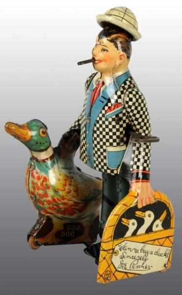 Appraisal: Tin Marx Joe Penner Walking Wind-Up Toy Description American Working