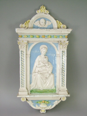 Appraisal: Italian majolica wall plaque moulded with the Madonna and child