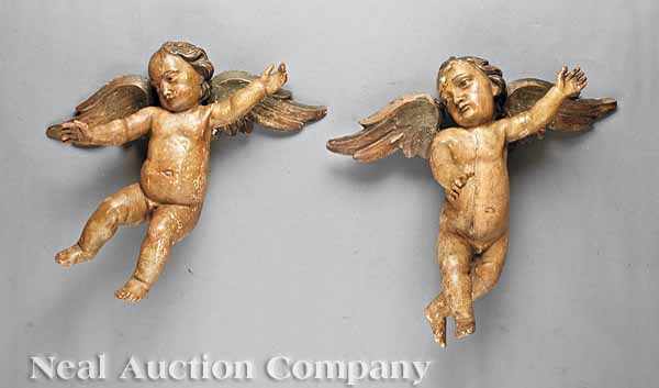 Appraisal: A Pair of Italian Polychrome Carved Wood Putti probably early