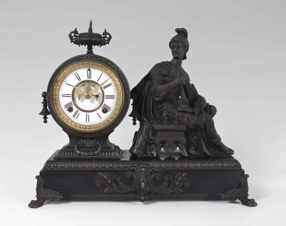 Appraisal: ANSONIA KNIGHT FIGURAL MANTLE CLOCK Spelter seated knight with urn