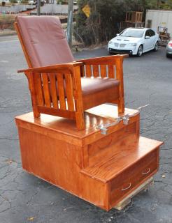 Appraisal: American shoeshine stand in oak with Mission style chair Leather