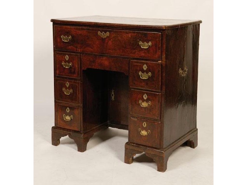 Appraisal: A GEORGE I WALNUT AND CROSSBANDED SECRETAIRE KNEEHOLE DESK the