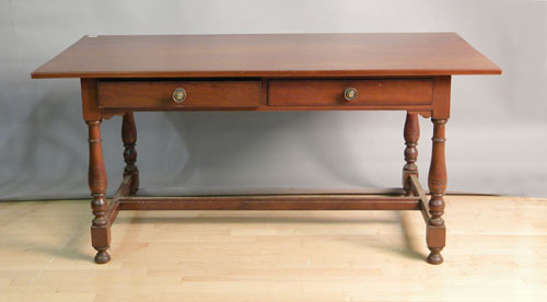 Appraisal: Pennsylvania Queen Anne style walnut farm table with two drawers