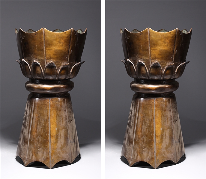 Appraisal: Pair of Chinese early style bronze candle holders with molded