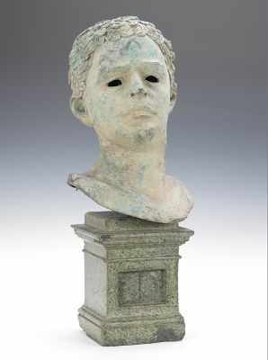 Appraisal: A Large Bronze Bust of a Young Man Cast bronze