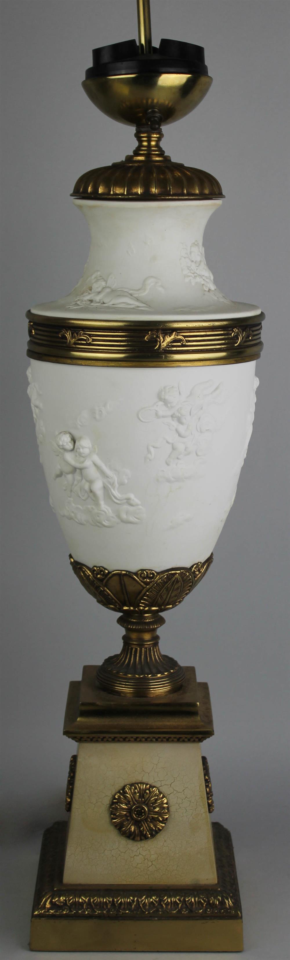 Appraisal: CONTINENTAL GILT METAL MOUNTED WHITE BISCUIT TABLE LAMP th Century