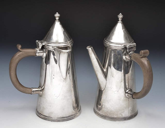 Appraisal: Silver coffee potand hot water jug of tapering cylindrical form