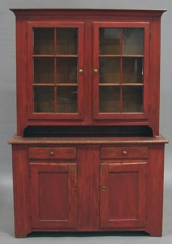 Appraisal: Cove-molded cornice twin -light doors shelves with spoon slots and