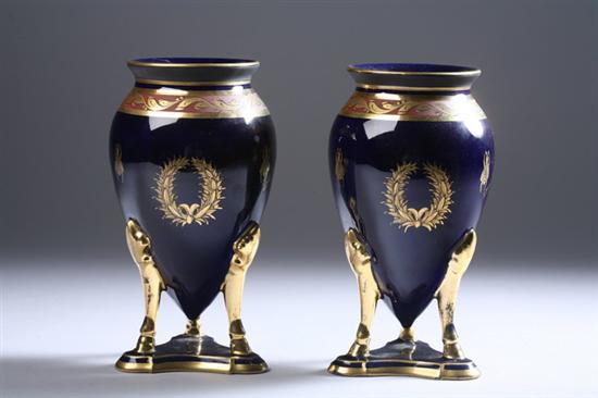 Appraisal: PAIR FRENCH PORCELAIN SHAPED URNS Jagete Pinon Tours mark Cobalt