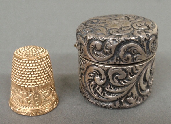 Appraisal: - Sterling silver repouss thimble case troy oz containing a