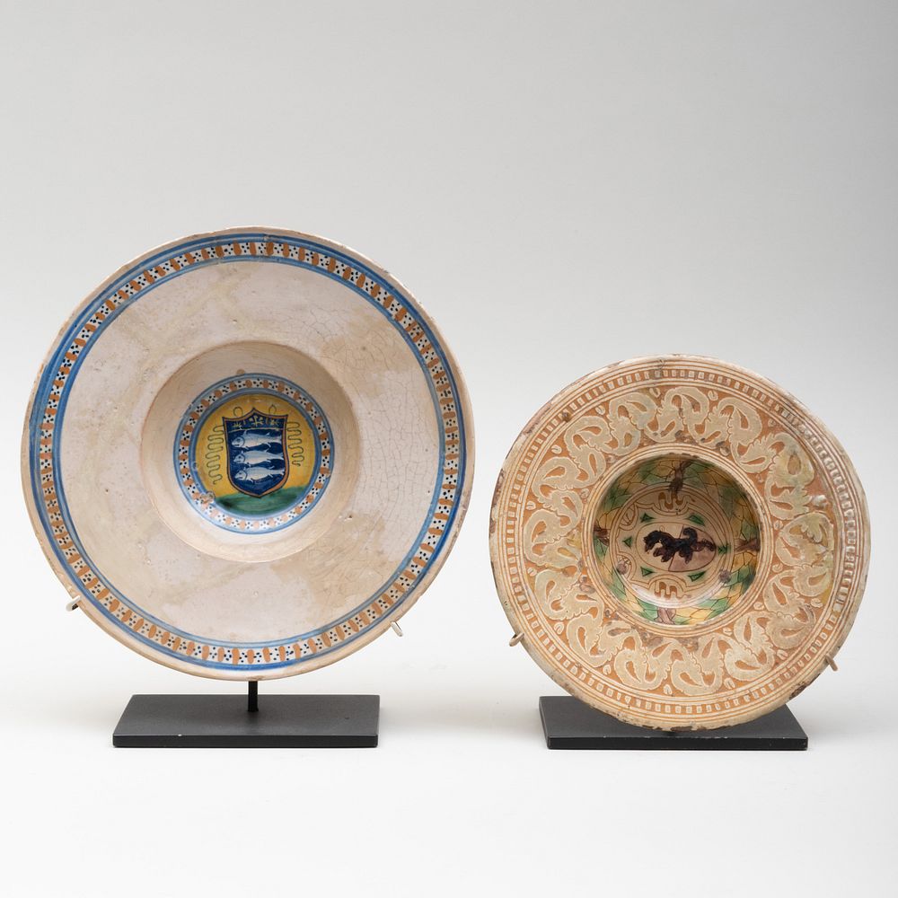 Appraisal: Two Continental Majolica Dishes The first decorated with fish in