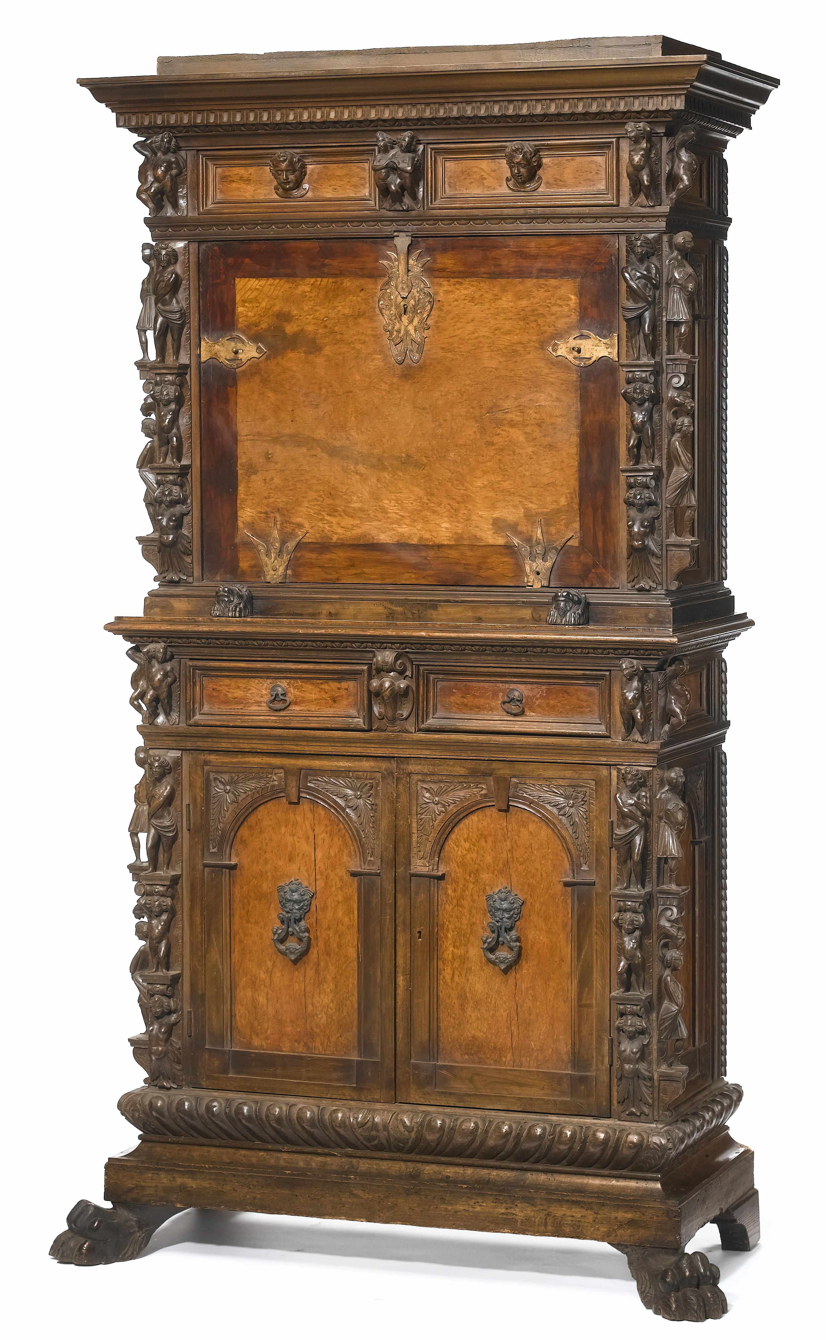 Appraisal: An Italian Renaissance Revival carved walnut bambocci incorporating antique and