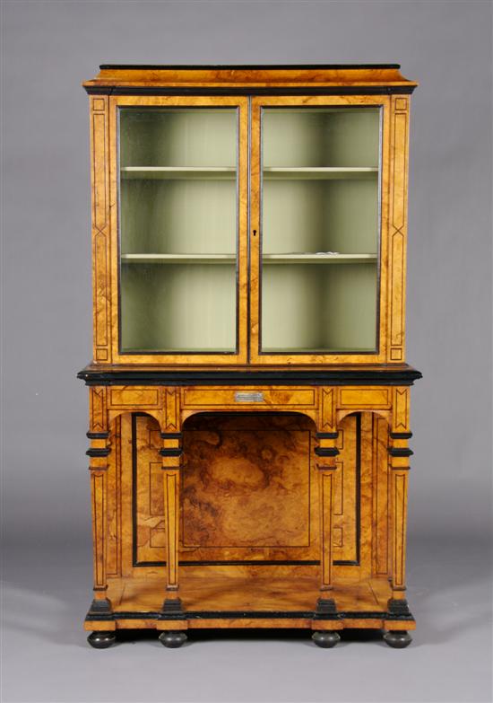 Appraisal: A Continental Burlwood and Ebonized Cabinet on Stand Height x